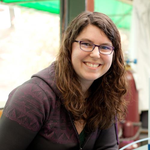 Happy young woman in glasses.